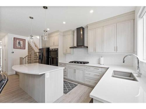 25 Carringham Heights Nw, Calgary, AB - Indoor Photo Showing Kitchen With Double Sink With Upgraded Kitchen