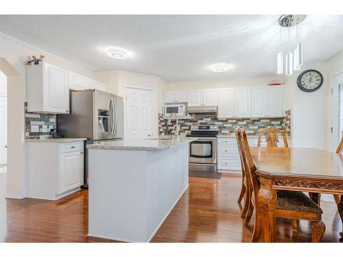 123 Chapalina Crescent Se, Calgary, AB - Indoor Photo Showing Kitchen With Upgraded Kitchen