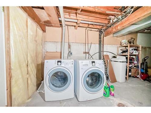 47-310 Brookmere Road Sw, Calgary, AB - Indoor Photo Showing Laundry Room