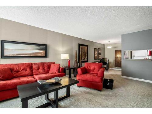 220-525 56 Avenue Sw, Calgary, AB - Indoor Photo Showing Living Room