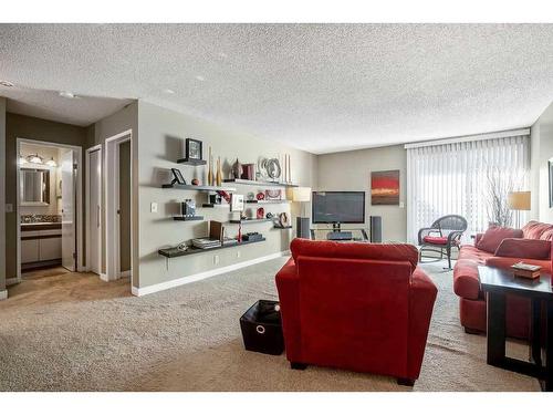 220-525 56 Avenue Sw, Calgary, AB - Indoor Photo Showing Living Room