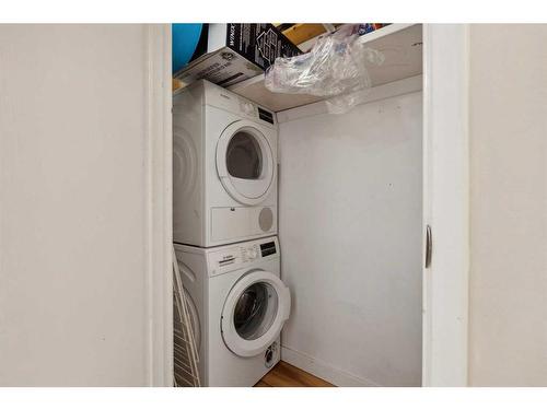 103-630 57 Avenue Sw, Calgary, AB - Indoor Photo Showing Laundry Room
