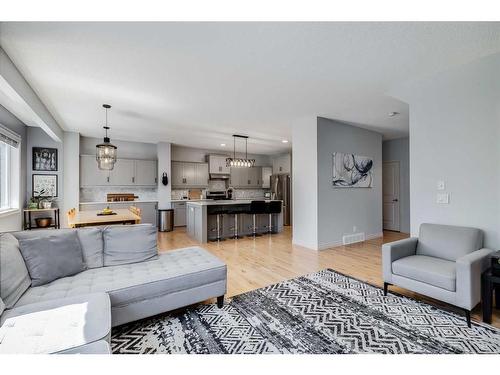 207 Cooperstown Lane Sw, Airdrie, AB - Indoor Photo Showing Living Room