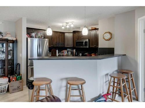 1429-8810 Royal Birch Boulevard Nw, Calgary, AB - Indoor Photo Showing Kitchen