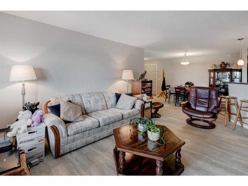 1429-8810 Royal Birch Boulevard Nw, Calgary, AB - Indoor Photo Showing Living Room