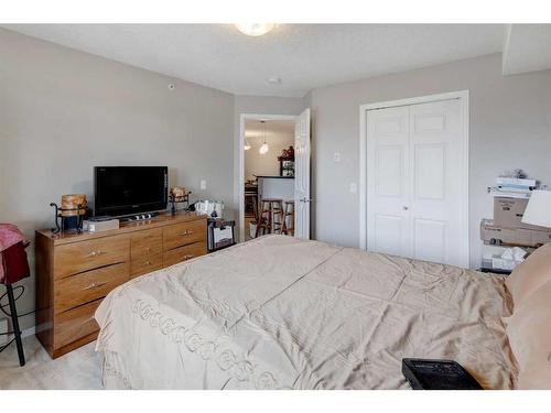 1429-8810 Royal Birch Boulevard Nw, Calgary, AB - Indoor Photo Showing Bedroom