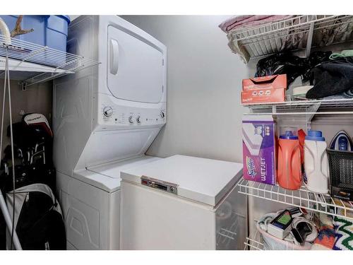 1429-8810 Royal Birch Boulevard Nw, Calgary, AB - Indoor Photo Showing Laundry Room