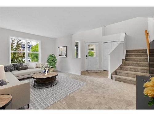 395 Silverado Drive Sw, Calgary, AB - Indoor Photo Showing Living Room