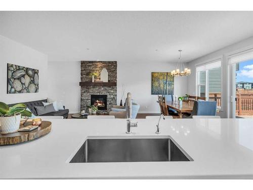 142 Howse Rise Ne, Calgary, AB - Indoor Photo Showing Living Room With Fireplace