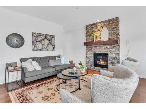142 Howse Rise Ne, Calgary, AB - Indoor Photo Showing Living Room With Fireplace