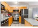 308-4000 Citadel Meadow Point Nw, Calgary, AB  - Indoor Photo Showing Kitchen With Stainless Steel Kitchen With Double Sink 