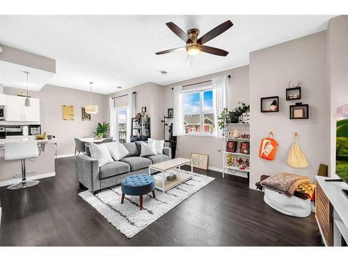 1907-881 Sage Valley Boulevard Nw, Calgary, AB - Indoor Photo Showing Living Room