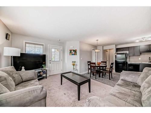 1714-250 Sage Valley Road Nw, Calgary, AB - Indoor Photo Showing Living Room