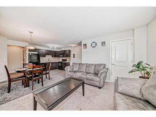 1714-250 Sage Valley Road Nw, Calgary, AB - Indoor Photo Showing Living Room