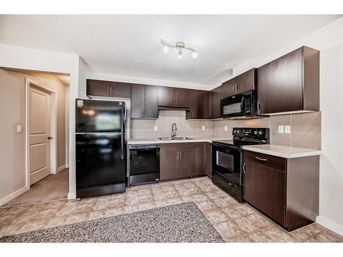 1714-250 Sage Valley Road Nw, Calgary, AB - Indoor Photo Showing Kitchen