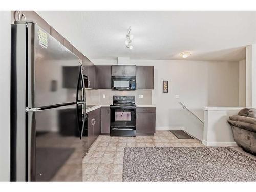 1714-250 Sage Valley Road Nw, Calgary, AB - Indoor Photo Showing Kitchen