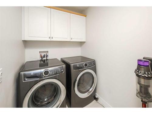 69 Hampstead Terrace Nw, Calgary, AB - Indoor Photo Showing Laundry Room