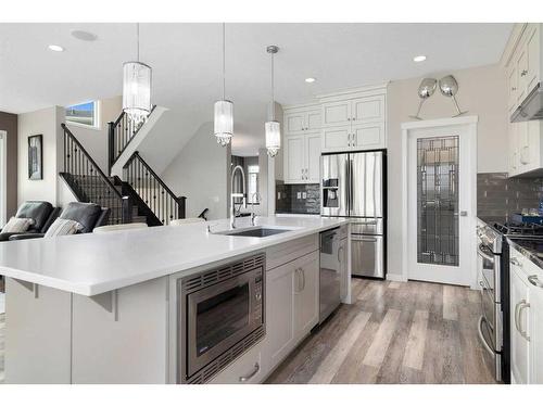 95 Silverado Crest Place Sw, Calgary, AB - Indoor Photo Showing Kitchen With Upgraded Kitchen