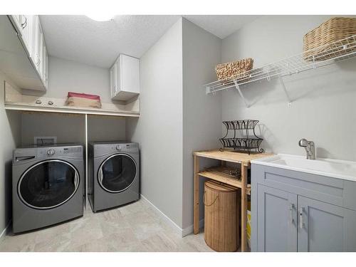 95 Silverado Crest Place Sw, Calgary, AB - Indoor Photo Showing Laundry Room