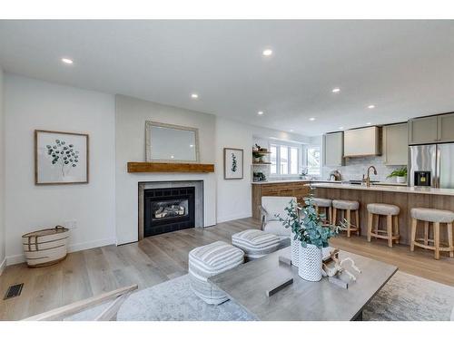 489 Sunmills Drive Se, Calgary, AB - Indoor Photo Showing Living Room With Fireplace