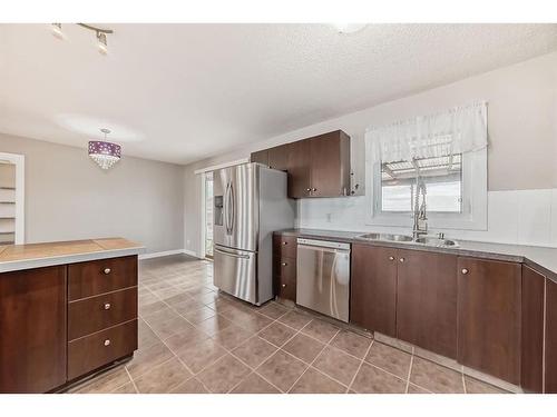 240045A Highway 1, Rural Wheatland County, AB - Indoor Photo Showing Kitchen With Double Sink