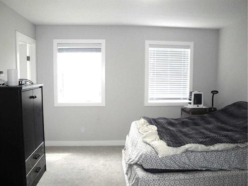 844 Lawthorn Way Se, Airdrie, AB - Indoor Photo Showing Bedroom