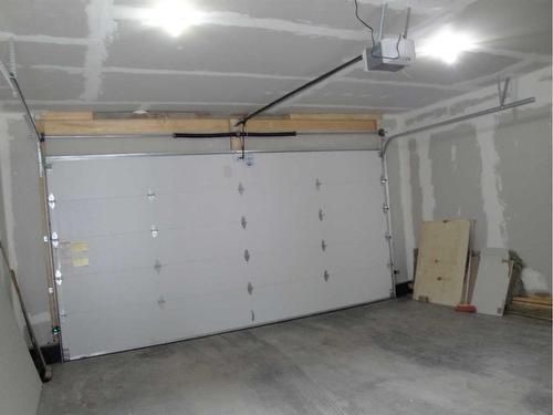 844 Lawthorn Way Se, Airdrie, AB - Indoor Photo Showing Garage