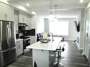 844 Lawthorn Way Se, Airdrie, AB  - Indoor Photo Showing Kitchen With Stainless Steel Kitchen With Upgraded Kitchen 