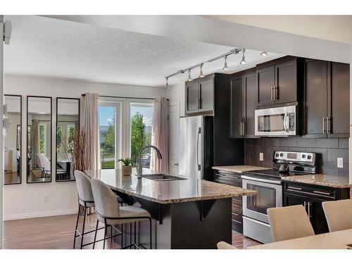 1406 Auburn Bay Square Se, Calgary, AB - Indoor Photo Showing Kitchen With Stainless Steel Kitchen With Upgraded Kitchen