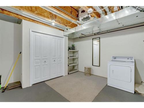 1406 Auburn Bay Square Se, Calgary, AB - Indoor Photo Showing Laundry Room