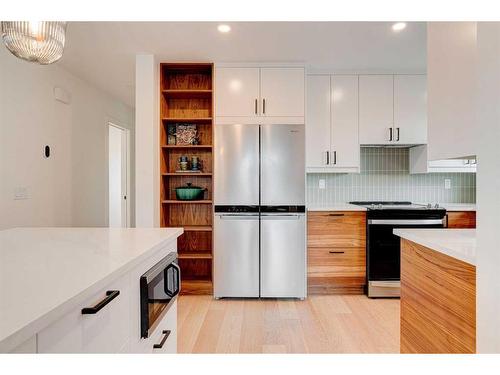 118 Fullerton Road Se, Calgary, AB - Indoor Photo Showing Kitchen With Stainless Steel Kitchen