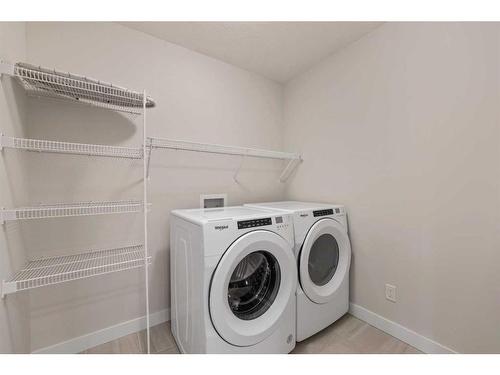 125 Creekstone Path Sw, Calgary, AB - Indoor Photo Showing Laundry Room
