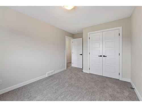 125 Creekstone Path Sw, Calgary, AB - Indoor Photo Showing Other Room