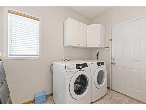 146 Coral Shores Cape Ne, Calgary, AB - Indoor Photo Showing Laundry Room