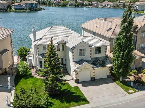 146 Coral Shores Cape Ne, Calgary, AB - Outdoor With Body Of Water With Facade