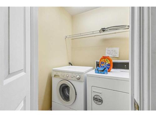 146 Coral Shores Cape Ne, Calgary, AB - Indoor Photo Showing Laundry Room