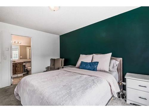 96 Hidden Creek Rise Nw, Calgary, AB - Indoor Photo Showing Bedroom