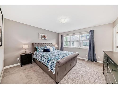 54 Masters Mews Se, Calgary, AB - Indoor Photo Showing Bedroom