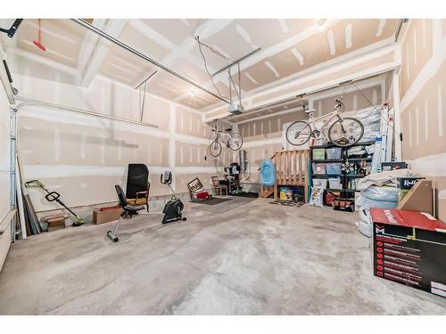 54 Masters Mews Se, Calgary, AB - Indoor Photo Showing Garage