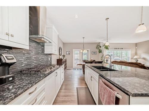 54 Masters Mews Se, Calgary, AB - Indoor Photo Showing Kitchen With Double Sink With Upgraded Kitchen