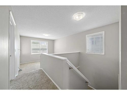 125 Hidden Spring Circle Nw, Calgary, AB - Indoor Photo Showing Other Room