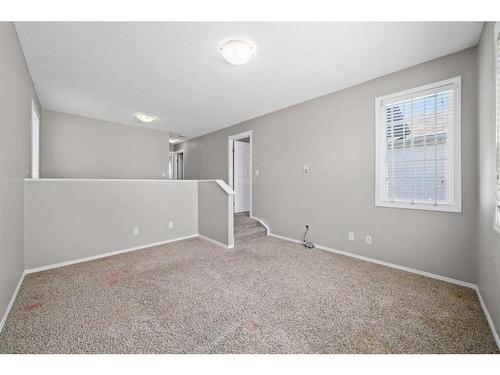 125 Hidden Spring Circle Nw, Calgary, AB - Indoor Photo Showing Other Room