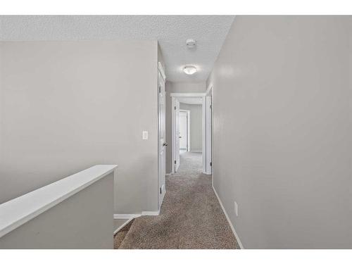 125 Hidden Spring Circle Nw, Calgary, AB - Indoor Photo Showing Other Room