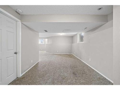 125 Hidden Spring Circle Nw, Calgary, AB - Indoor Photo Showing Other Room