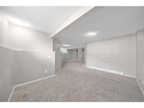 125 Hidden Spring Circle Nw, Calgary, AB - Indoor Photo Showing Other Room