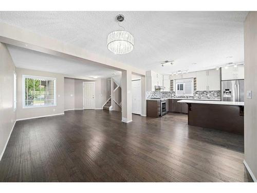 125 Hidden Spring Circle Nw, Calgary, AB - Indoor Photo Showing Living Room