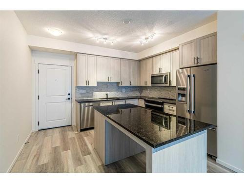 5205-15 Sage Meadows Landing Nw, Calgary, AB - Indoor Photo Showing Kitchen With Stainless Steel Kitchen With Double Sink With Upgraded Kitchen