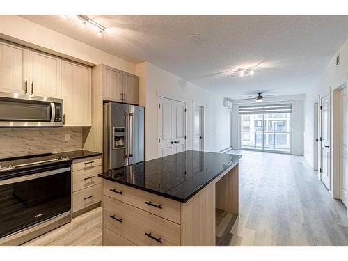 5205-15 Sage Meadows Landing Nw, Calgary, AB - Indoor Photo Showing Kitchen With Stainless Steel Kitchen With Upgraded Kitchen