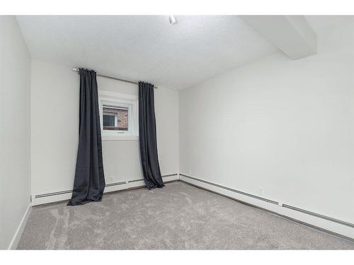 2-2031 34 Avenue Sw, Calgary, AB - Indoor Photo Showing Other Room