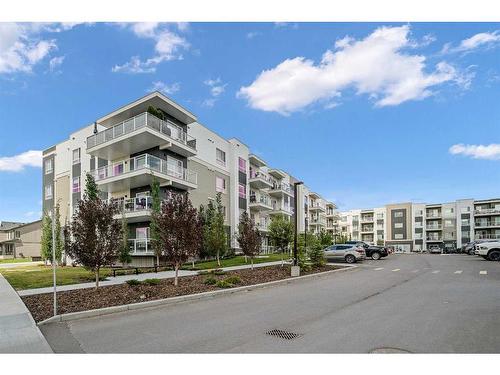 2208-220 Seton Grove Se, Calgary, AB - Outdoor With Balcony With Facade